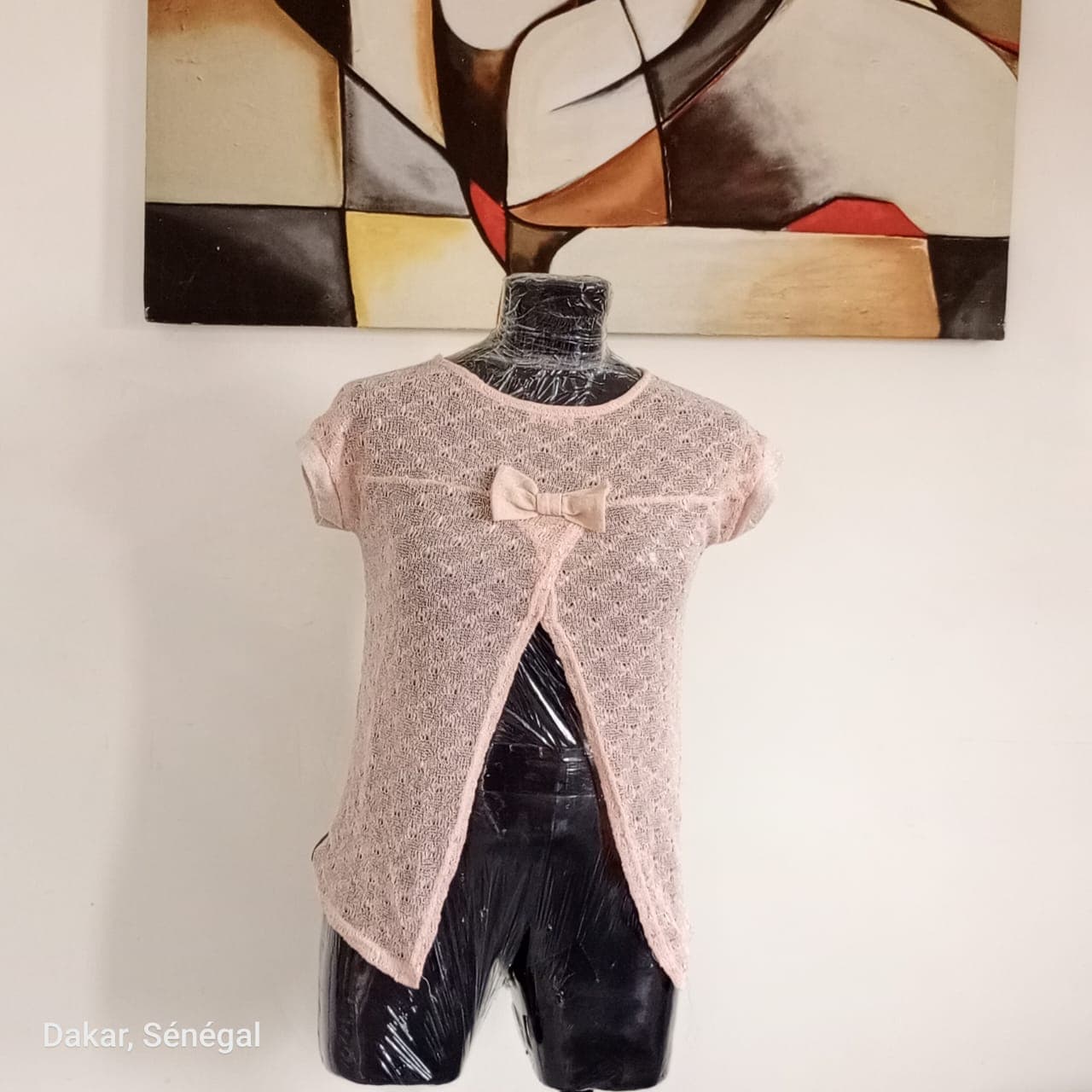 Haut rosé ouvert derrière